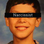 A portrait of Jason Bolduc in fourth grade with the word "narcissist" spelled out over his eyes. The photo sits on a table.